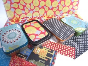 Cut patterned paper to fit your tins