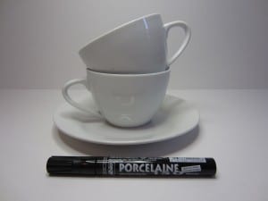 Plain white dish ware and a porcelain pen