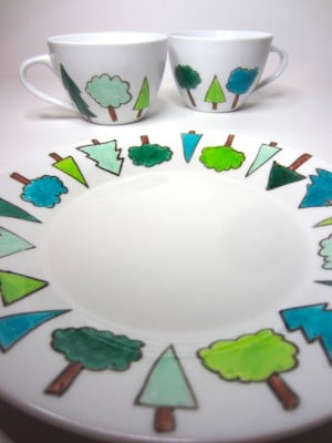 Plate and tea cups decorated using porcelain pens