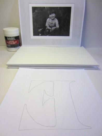 Materials needed to transfer black and white photos and letters to canvas. The letters get transferred backwards in this project.
