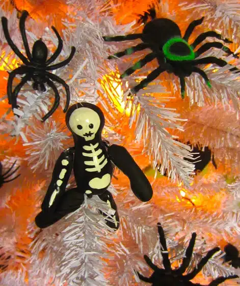 Hiding in a Halloween-themed tree