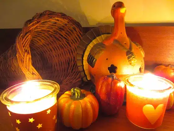 Remembrance Candles lit among holiday decorations