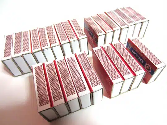 Rows of matchboxes are glued together