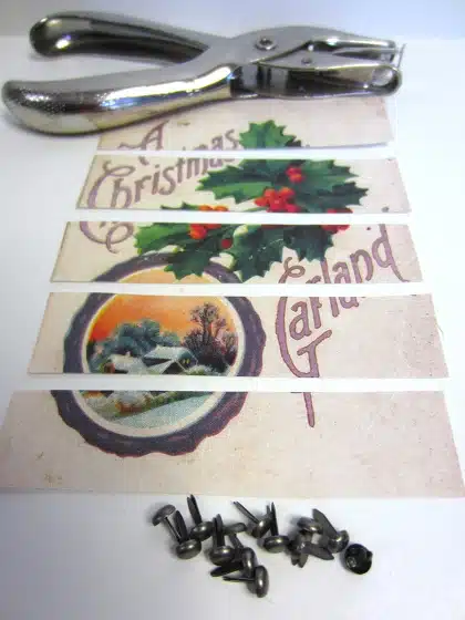 A holiday card is cut into strips