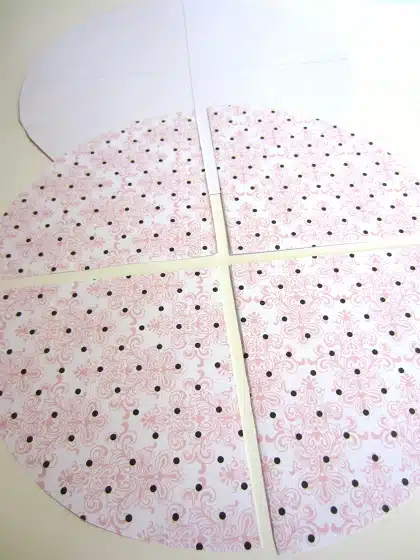 Cut a paper circle into four sections like so