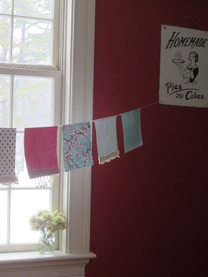 Shabby chic paper flag garland hung for decoration