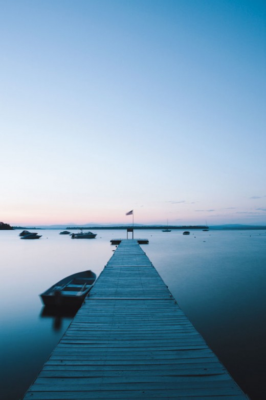 From the dock at Hero's Welcome store/cafe, the sun rises over North Hero Island.