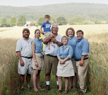The L'Etoiles of Four Star Farm; from left, Jacob and Robin, Gen holding little Hugh, Bonnie, Liz, and Nathan.
