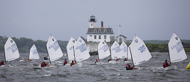 462 Optimist dinghies off shore from Rose Island Lighthouse. 