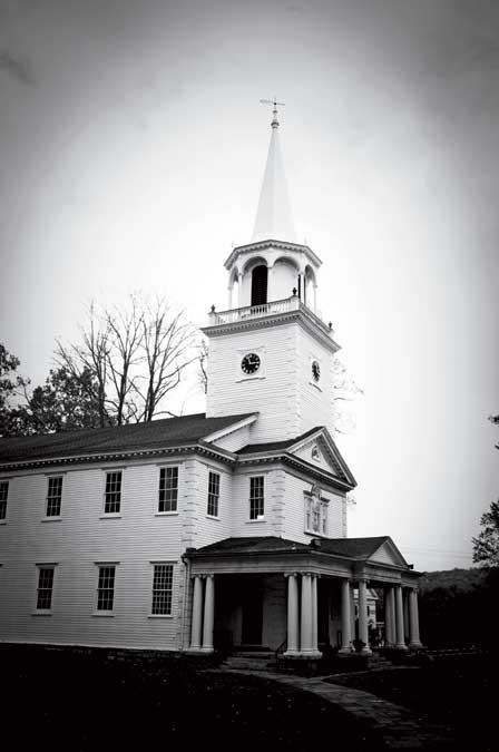 The classic exterior of First Congregational Church, built in 1801, on the Washington Green.