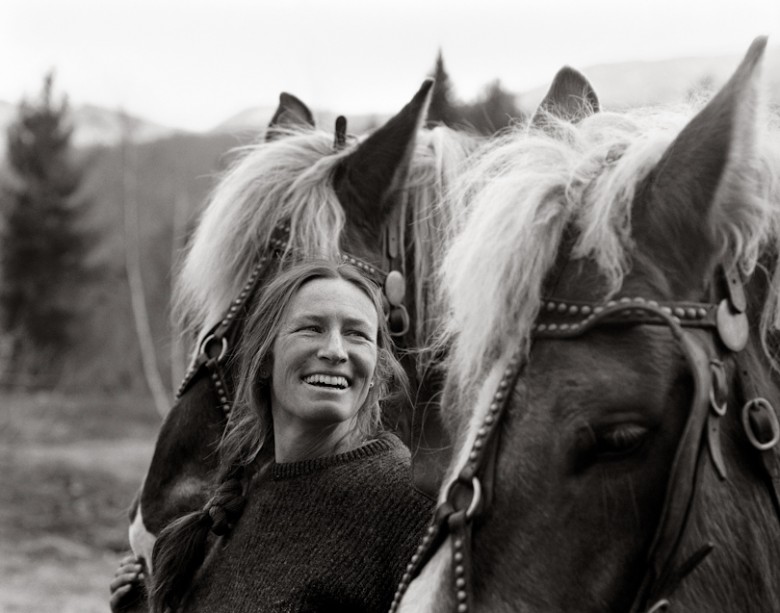 Deb Ravenelle, sugarmaker, sleigh and carriage driver, with her horses Rex and Burt, Johnson, 2000.