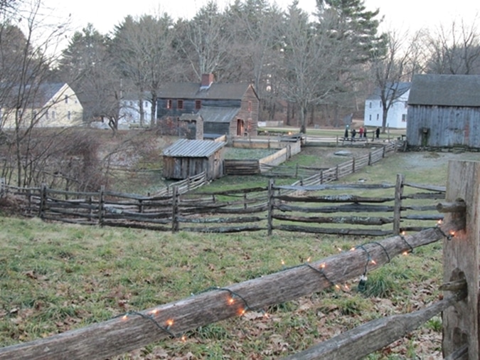 From the Village entrance, the Fenno Barn and House are in view--the oldest structures in the Village (c. 1725).