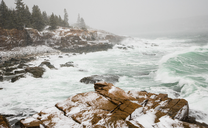 Waves pounding the shore during a winter storm in Acadia National Park.
