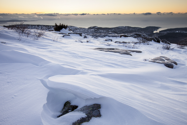 Sunrise on Cadillac Mountain in Acadia National Park after a winter storm.