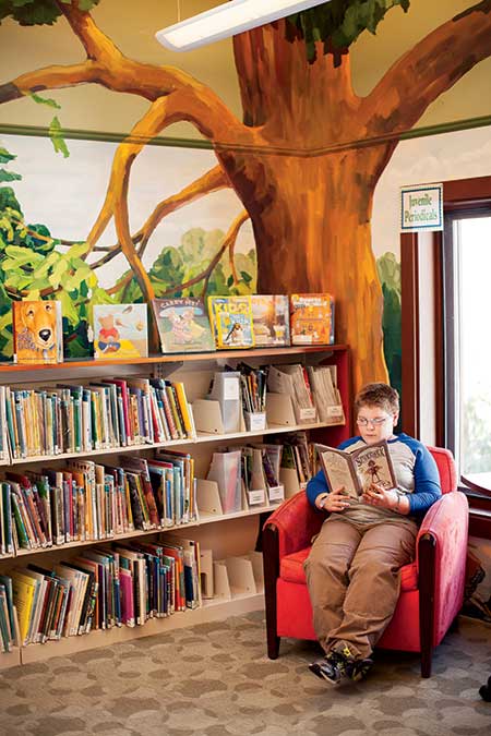 The town library is a hub for young and old.