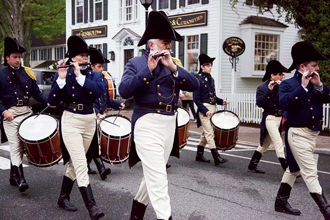 Wearing reproduction period U.S. Navy uniforms, the Sailing Masters of 1812 fife & drum corps strikes the right tune at the Loser’s Day Parade each May.