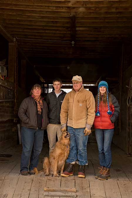 Intervale Farm | Jan, Eric, Carl, and Lucy Wilcox with their golden retriever, Midge.