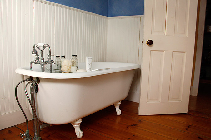 While updated, the style of the bathroom maintains its historic roots.
