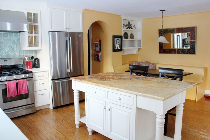 The kitchen includes a spacious eat-in area.