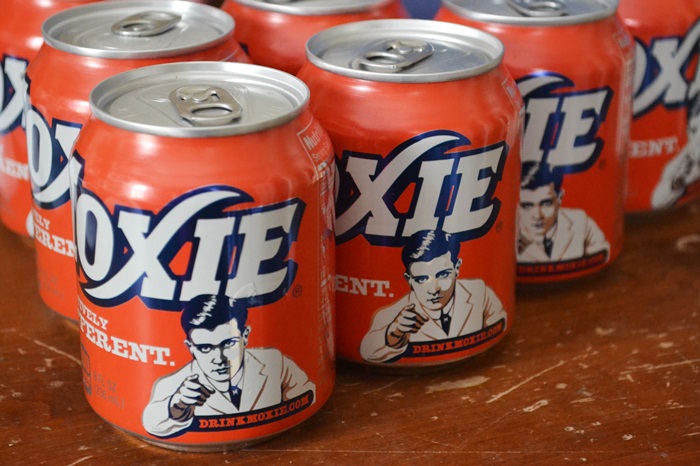 Moxie- the longest continuously produced soft drink in the United States,  its flavor is somewhere between root beer and cola, it does have root  extracts in it so it technically counts. kinda