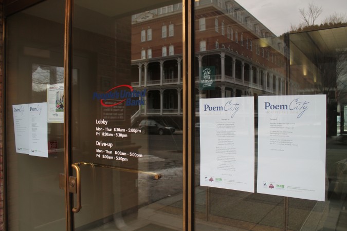 At People's United Bank, before you cash a check you can check out three poems. 