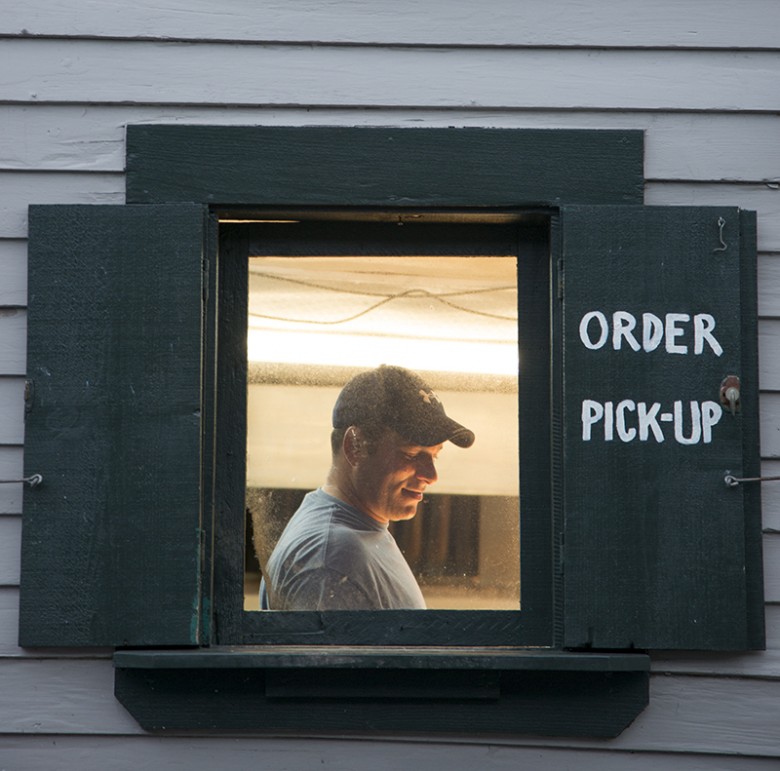 Illuminated order pick-up window at Five Islands.
