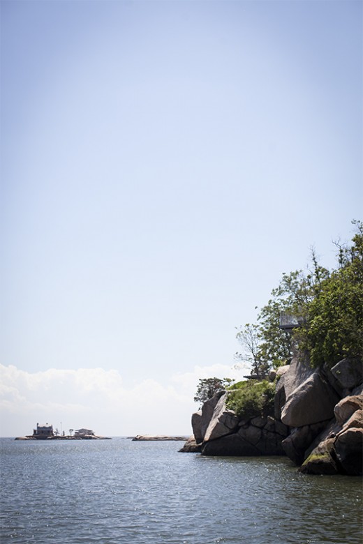 Davis Island, where President Taft summered, is seen in the foreground with an observatory deck set on an outcropping of rock.  Grey Rock Island is seen in the distance with Mother-in-law off to the right.