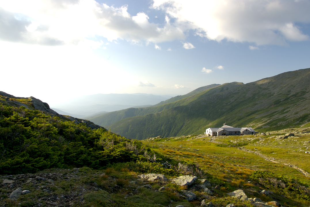 The AMC Lakes of the Clouds Hut, strategically located between the summits of Mt. Washington and Mt. Monroe, provides refuge for hikers all summer long.