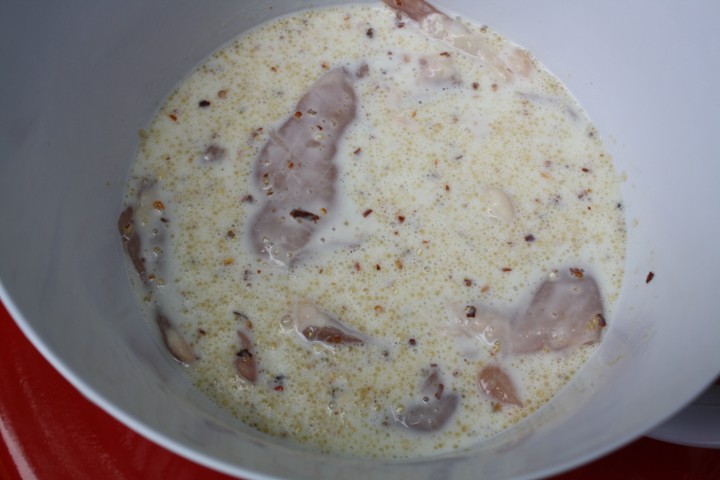 A buttermilk brine simultaneously tenderizes the meat, adds flavor, and keeps the meat moist during cooking.