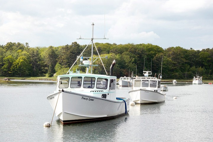 Boats bob on the waves in the Kennebunk River.