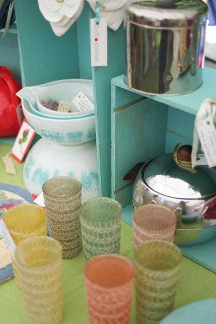 Vintage glassware and bowls at Dish Sisters' booth.