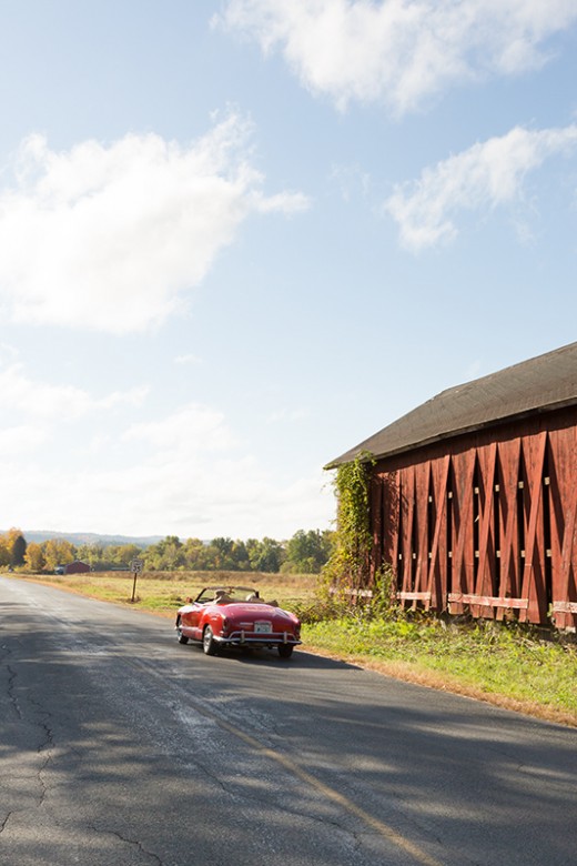 Bill and Dutchie's vintage Karmen Ghia and a classic tobacco barn along Falls Road in Sunderland.