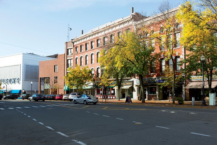 Locally owned shops (including Wilson’s Department Store, founded in 1882, far left) anchor Greenfield’s classic Main Street.