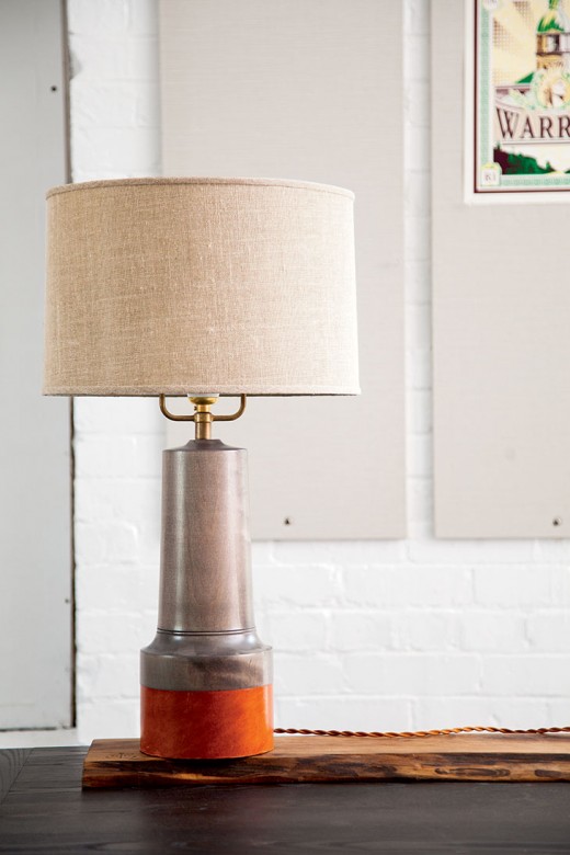 O&G’s maple-and-leather “Point Judith” lamp.