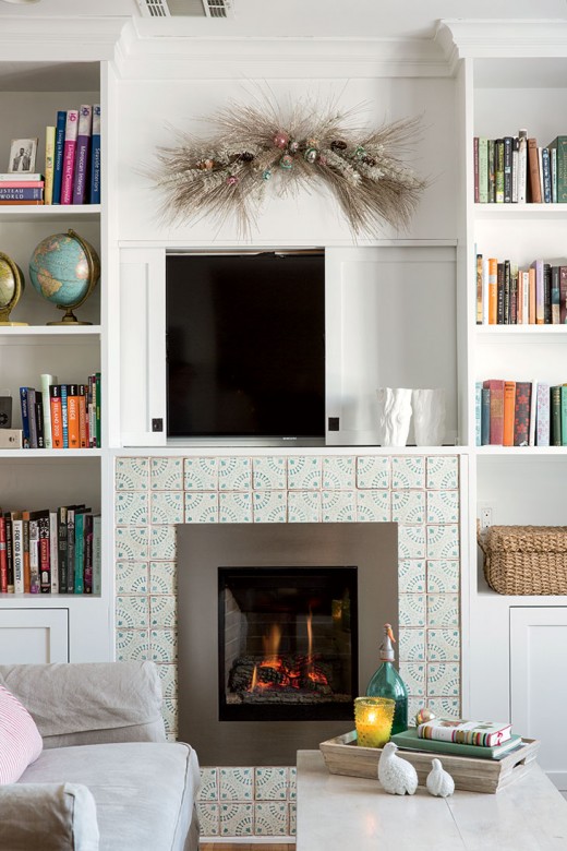 Standley designed the built-in fireplace façade, which features tiles she found during her travels. 