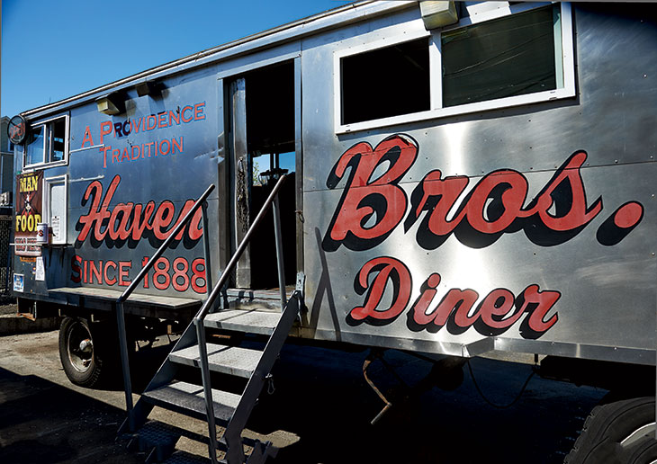 Every night at 5:00 p.m., the diner rolls up to City Hall, towed by a truck. 