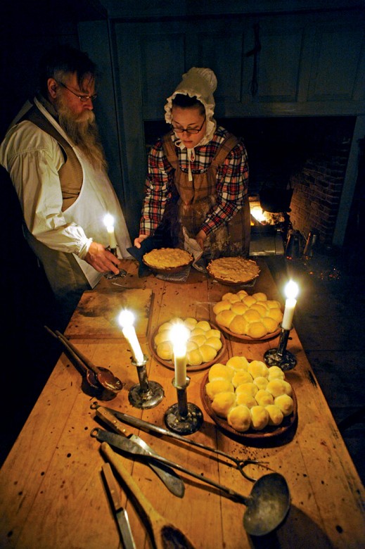 For Old Sturbridge Village’s “Dinner in a Country Village” series, costumed staffers prepare dinner using 19th-century recipes and technology, including making pies and rolls in a wood-fired oven.
