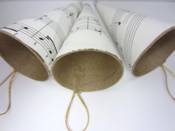 Cover the cones with sheet music