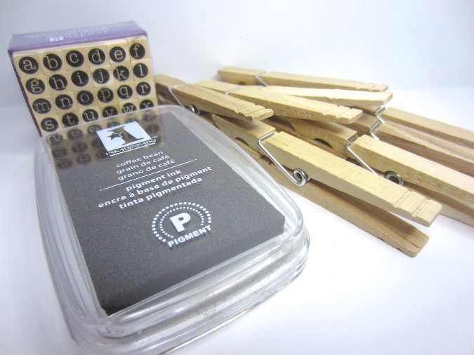 Alphabet rubber stamps, ink pad, and clothespins