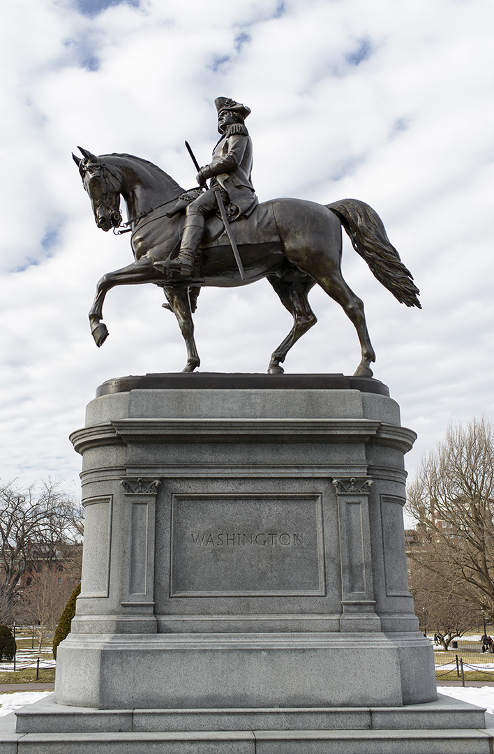 The iconic George Washington Statue created by artist Thomas Ball and dedicated in 1869 stands proudly in Boston Public Garden.
