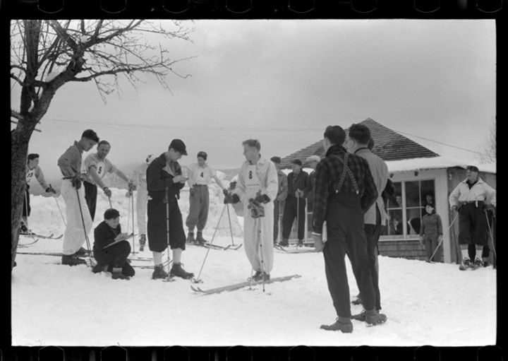 Skiers during the noon hour outside of the toll house at the foot of Mount Mansfield circa 1939. Photographed by Marion Post Wolcott (1910-1990).