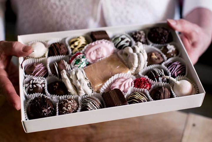 Denise Eckhardt’s chocolate samplers include bonbons, chocolate-covered cherries,  white-chocolate-dipped pretzels, and truffles.