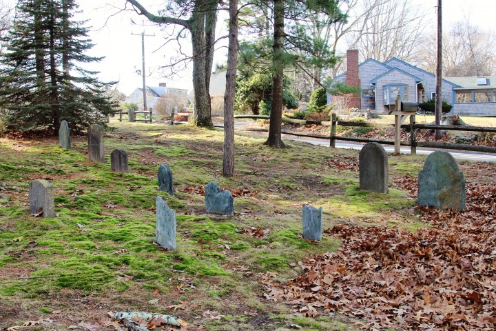 A small grouping of 18th century headstones facing the street, Pilgrim By Way.