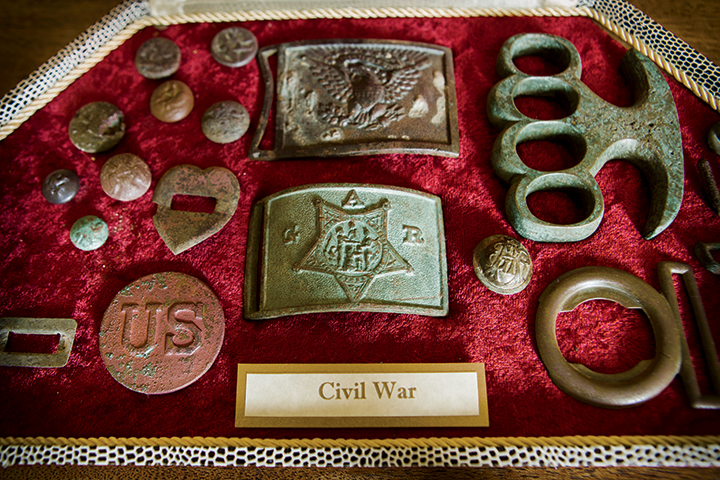 Lance Comfort’s collection of Civil War finds includes buttons, belt buckles, and other metal artifacts.