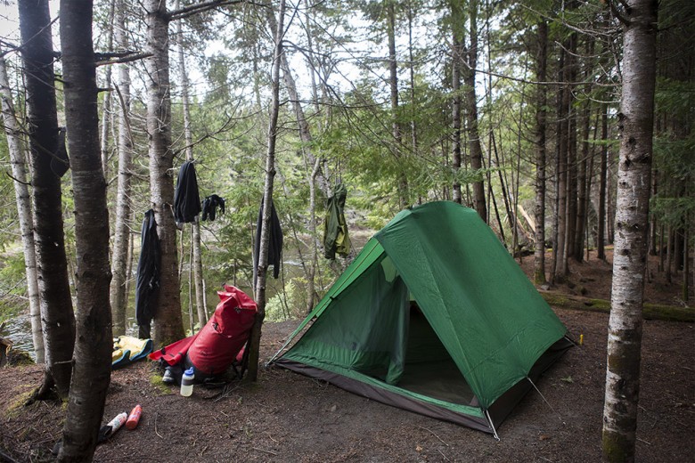 One of the Eureka tents provided by Mahoosuc Guide Services, some of which housed people, while others housed gear. “Surprisingly, you’d see quite a few open tents like this during the beginning of the trip because the black flies weren’t out yet and with everything being so wet, it was good to try and dry them out as much as possible each day if it wasn’t raining,” says photographer Jarrod McCabe. 