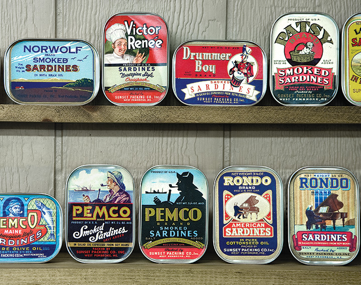 Part of the long gallery of tins at the Maine Coast Sardine History Museum.