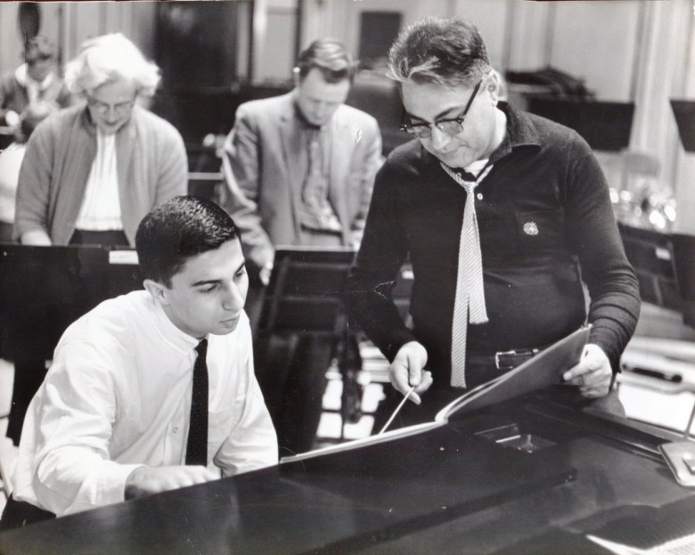 1961: Conductor Rouben Gregorian and his son, soloist Leon Gregorian, at rehersal.