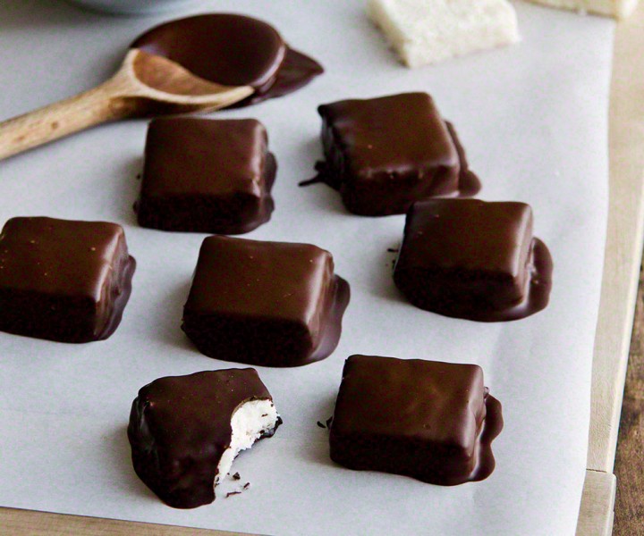 The dark-chocolate-covered coconut-cream treat known as needhams.