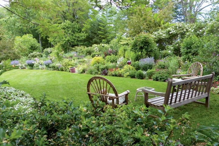 The surrounding garden, with benches and stone walls, is on 3 acres, with an additional 12 in conservation.
