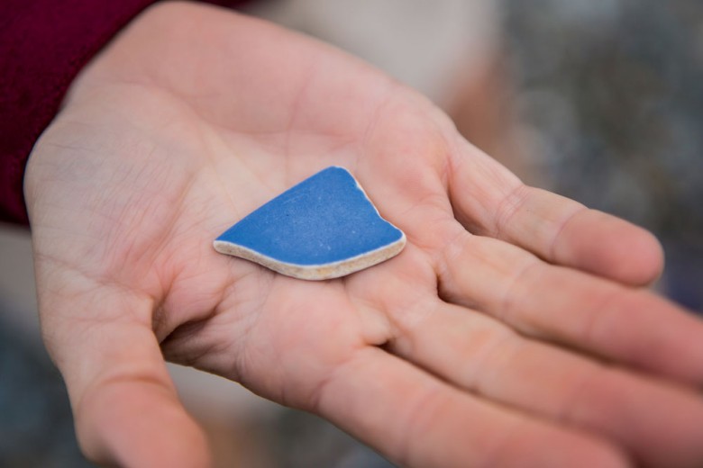 A ranger holds of shard of sea glass found on Spectacle Island. You can’t take your beachcombing finds home with you, but you’re welcome to leave them for display at the island visitors’ center.